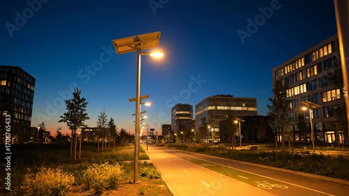 Solar powered street lamps glowing night cinematic UHD eco sustainable city stock video. photovoltaic illumination radiant dusk filmic ultra high definition green future town