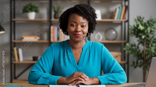 Teacher smiling while hosting online video class cinematic UHD EdTech lifestyle stock footage. educator beaming virtual lesson filmic ultra high definition educational