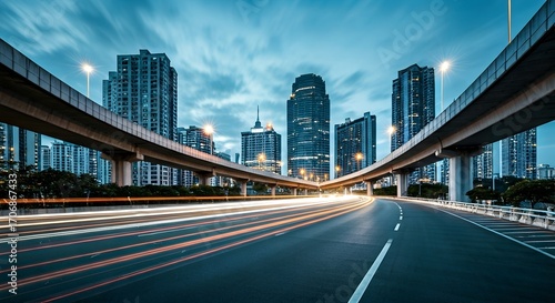 Blurry cityscape with highway overpasses and skyscrapers at dusk