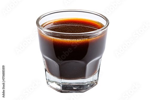 a shot of coffee in a glass on a white background
