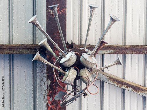 A vintage sports stadium horn with multiple elements and weathered patina that tells stories of cheering crowds and unforgettable moments.