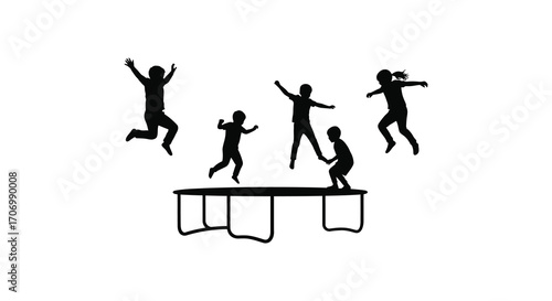 children playing joyfully on a trampoline in silhouette