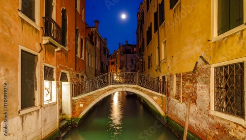Venetian canal at night under a full moon