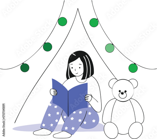 Young girl in star pajamas reading a book next to a teddy bear under green garland child