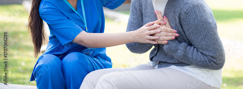Wallpaper Mural Caucasian woman chest pain while nurse first aid in outdoor park, emergency of patient with injury and urgency, disease of woman and aid, medical and accident, sick of patient and expression. Torontodigital.ca