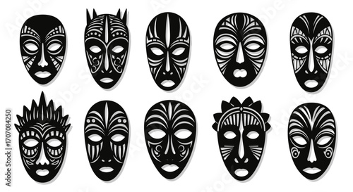 Collection of stylized, black and white tribal masks, showcasing intricate patterns and designs.