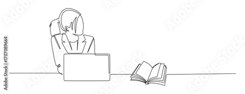 Continuous line art of a businesswoman working in front of a laptop with an open book beside her. Busy business owner concept.

