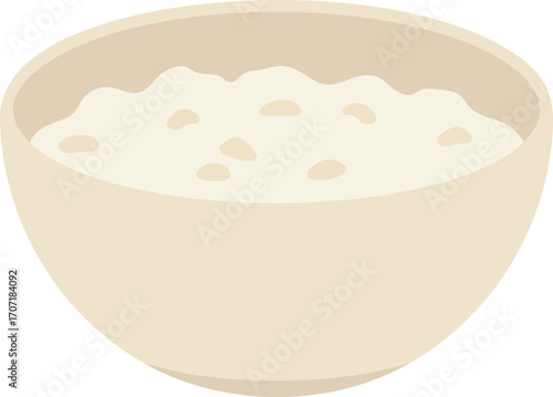 A light beige bowl filled with a light beige porridge or oatmeal.