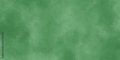 Abstract Elegant dark green background with mottled vintage texture in old fancy background design, texture of colored parchment paper.	