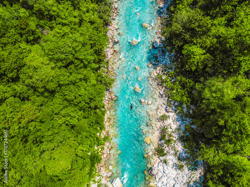 Wallpaper Mural Rafting and kayaking place on the river. Kayakers in colorful life jacket paddling in Soca river, kobarid, Triglav National Park, Slovenia Torontodigital.ca