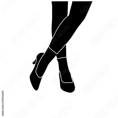 Elegant silhouette of crossed legs in heels.