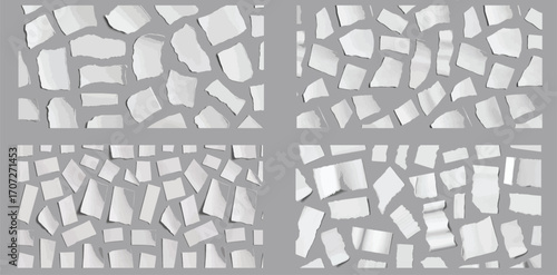 Collection of torn, ripped pieces of white color paper.