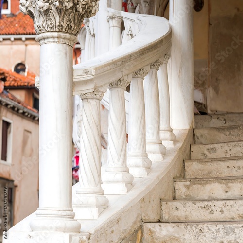 Ornate marble staircase with columns