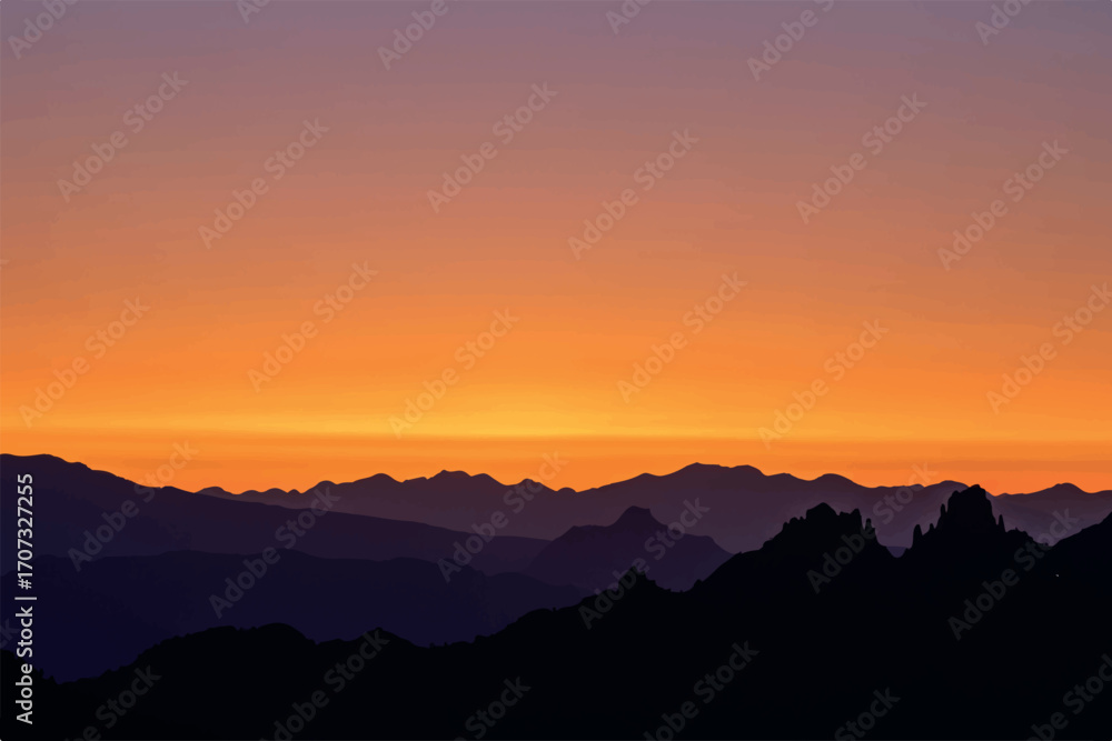 Fototapeta premium Silhouetted mountain ranges fade into a vibrant orange and purple sunset sky.