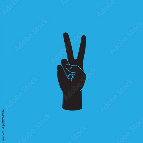 Silhouette of a hand making a peace sign against a vibrant blue background.