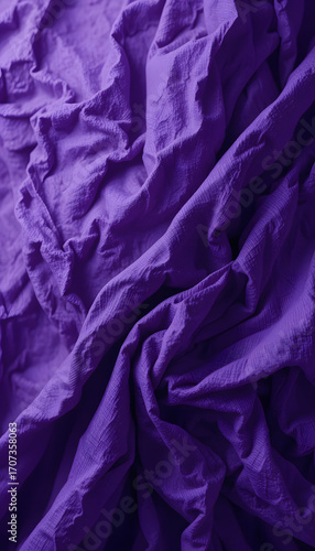 wrinkled purple cloth surface.