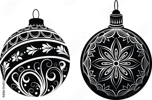 Black and white ornate Christmas baubles with intricate designs