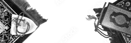 Quran with prayer mate, Rehal with open Quran on Muslim prayer mat indoors. Space for text - Image (16-09-2025) Hazro Attock