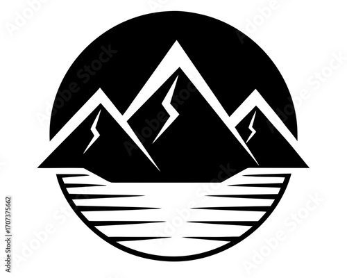 Black silhouette of mountains reflected in water
