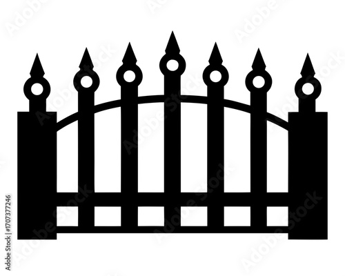 Black silhouette of a wrought iron fence with pointed finials and an arched top