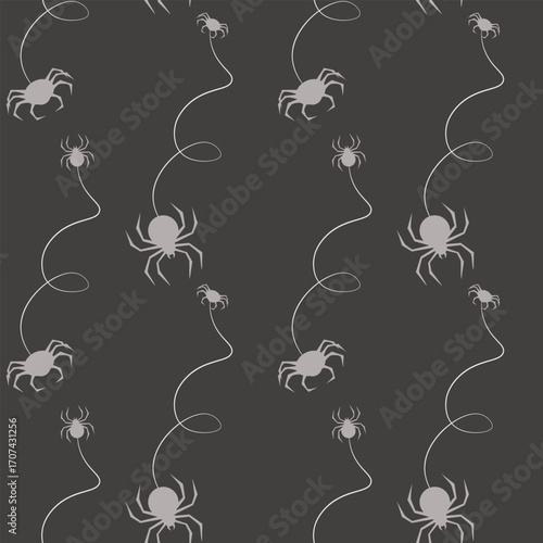 Seamless pattern of spider silhouettes hanging from spiral webs on a dark gray background. Charming and slightly spooky design is perfect for Halloween stationery, fabric prints or digital paper.