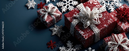 Red and white gift boxes with red bows on a blue background