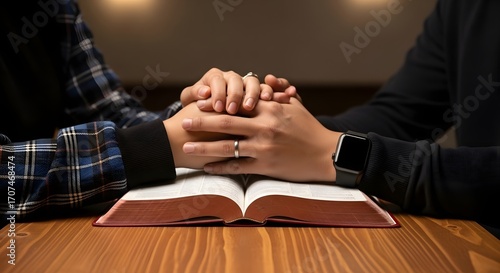 Couple praying together over bible marriage and faith concept christian love and relationship goals