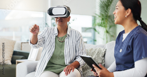 Medical, tablet or virtual reality with nurse and old woman in home for cognitive rehabilitation. App, healthcare or vr headset with caregiver and senior patient in apartment for reminiscence therapy