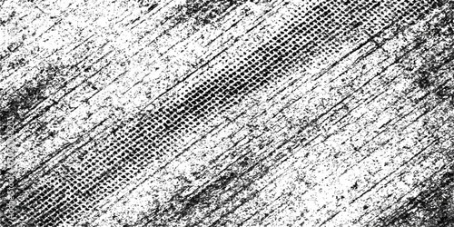 Metal texture with an aged, rough surface and a black and white abstract pattern