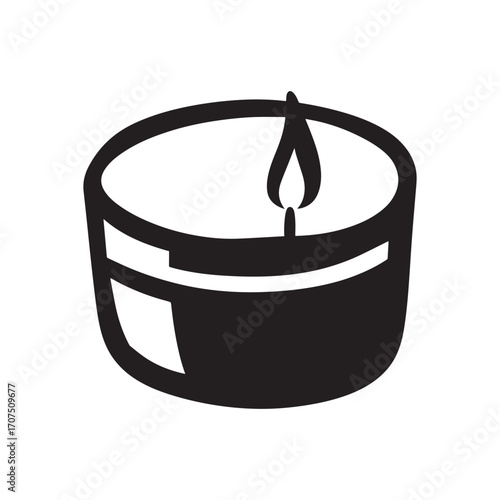 Silhouette of a small candle inside a cup. The candle is low and round with a small flame. 