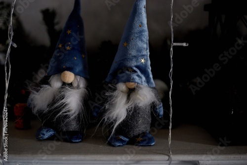 Two gnome toys on Christmas Eve evening