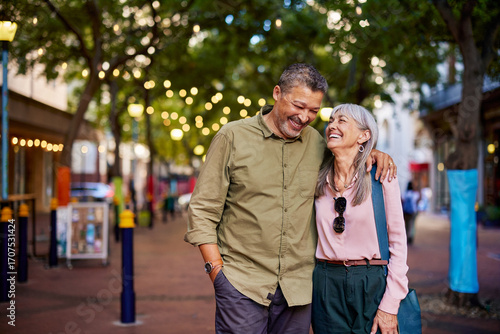 Wallpaper Mural Happy mature couple laughing outdoors Torontodigital.ca