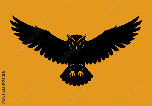 A black owl with yellow eyes is displayed against an orange background with its wings spread