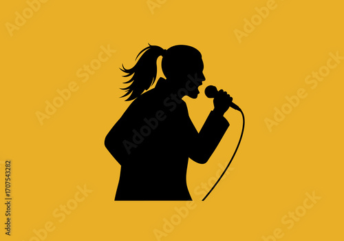 A black silhouette of a woman singing into a microphone against a mustard yellow background