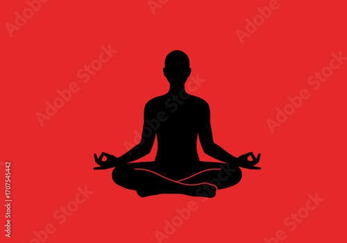 Silhouette of a figure in a lotus position against a red background