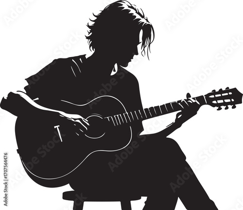 Silhouette of a person playing an acoustic guitar music