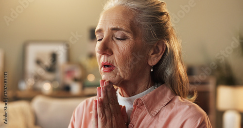 Quadro em tela Belief, hope and prayer with senior woman on sofa in living room of home for trust in Christ Jesus