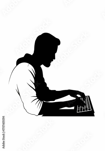 Silhouette of a person working on a keyboard.