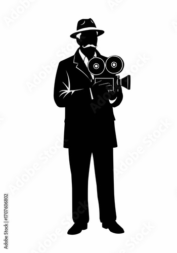 A silhouette of a classic filmmaker standing holding a vintage camera. 