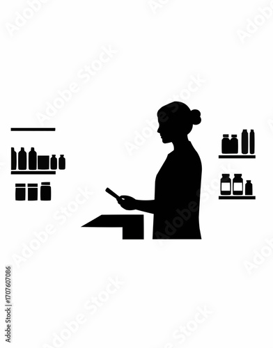 A Pharmacist at work, dispensing medication.