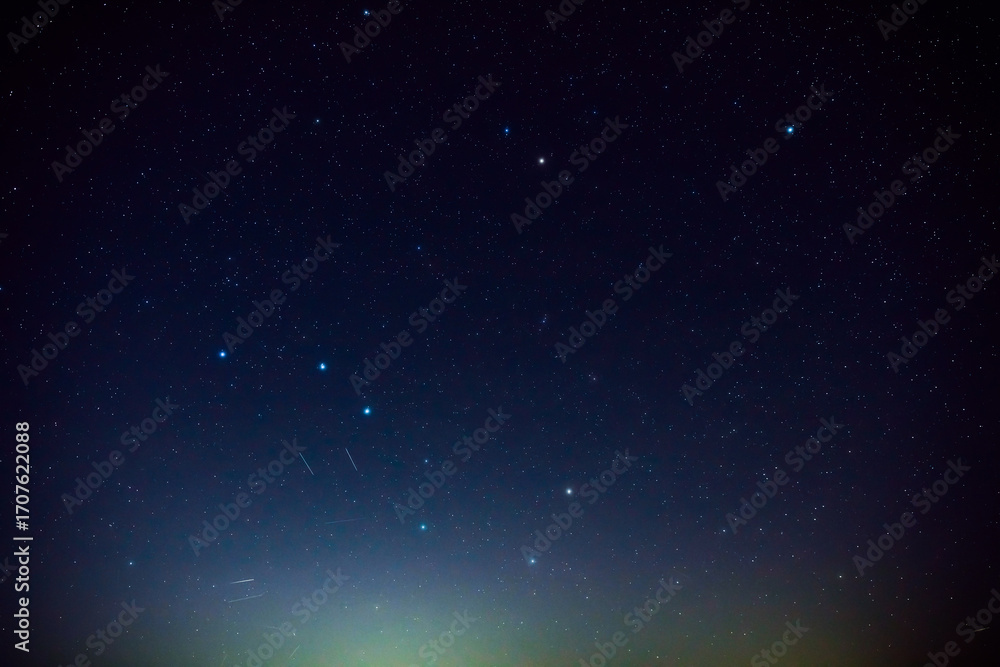 Obraz premium Milky way stars and constellations with a galaxy background.