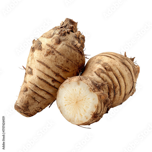 Two light-brown root vegetables, one halved, showing white interior