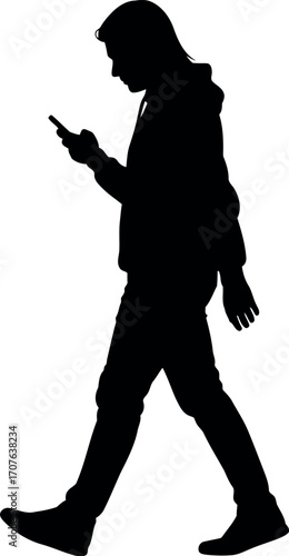 Vector art of silhouette of a young person walking while looking at their phone transparent background