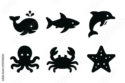 Silhouette icons of sea creatures: whale, shark, dolphin, octopus, crab, starfish