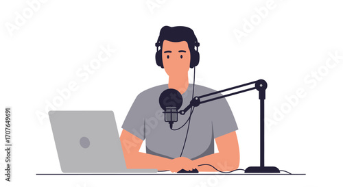 A man with headphones records a podcast or streams online using a professional microphone and a laptop.