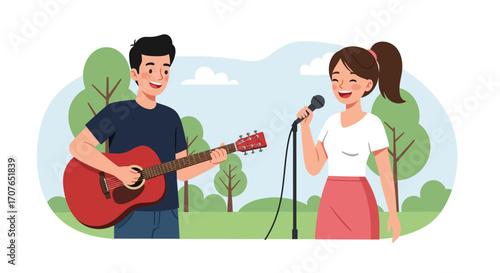 A happy young couple making music together outdoors, with a man playing the acoustic guitar and a woman singing into a microphone.