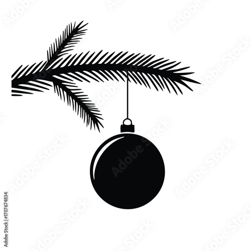 Black silhouette of a Christmas tree branch with an ornament