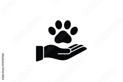 Hand holding a paw print symbolizing animal care