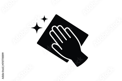 Hand wiping surface with cleaning cloth and sparkles