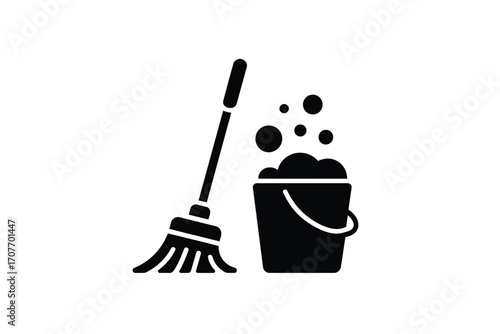 Black and white icon of a mop and bucket with suds